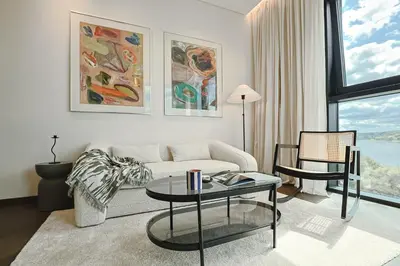 a living room with a couch and a table at River home in Kaunas