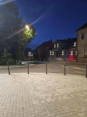 a street light on a street at night at VV apartamentai in Kaunas