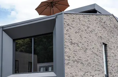 a building with a umbrella on top of it at MARVEL apartamentai in Kaunas
