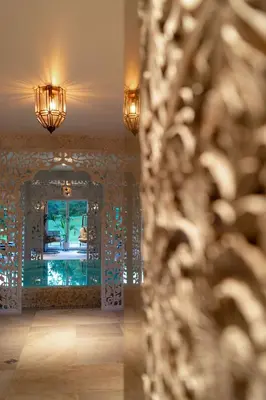 a hallway with a mirror in a room at Shanti Resort & Deluxe SPA in Sarboriškės I