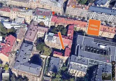 an overhead view of a city with a yellow sign at Cozy & Silent Apartment in Vilnius