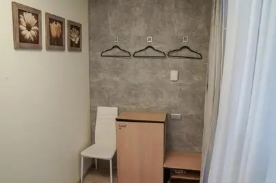 a office with a desk and a chair in a room at A5 apartment in Vilnius