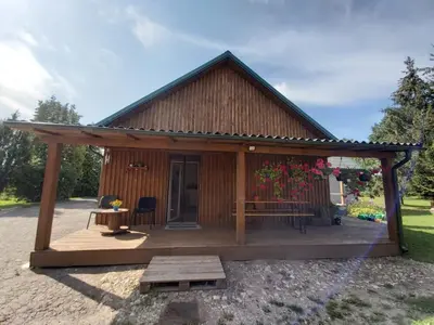 Gallery image of Cozy farmhouse next to a pond for a peaceful retreat in Jaunakaimis