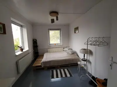Gallery image of Cozy farmhouse next to a pond for a peaceful retreat in Jaunakaimis