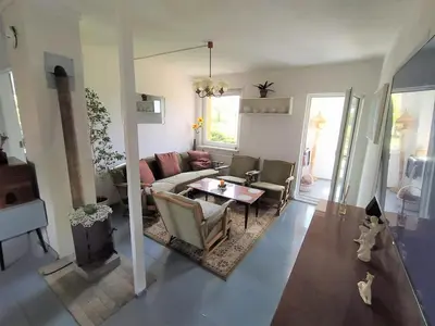 Gallery image of Cozy farmhouse next to a pond for a peaceful retreat in Jaunakaimis