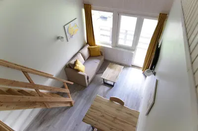 an overhead view of a living room with a couch at Vila Pakaso malūnas in Kirdeikiai