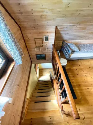 an overhead view of a staircase in a tiny house at Marga Pieva in Inturkė