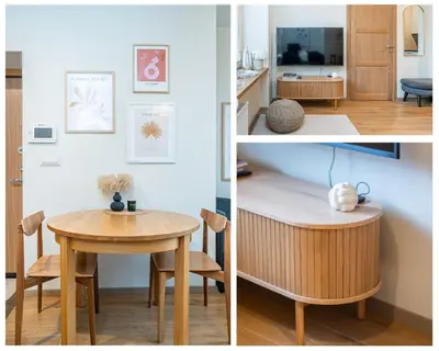 a kitchen and a dining room with a table and chairs at Butukas dviems in Vilnius