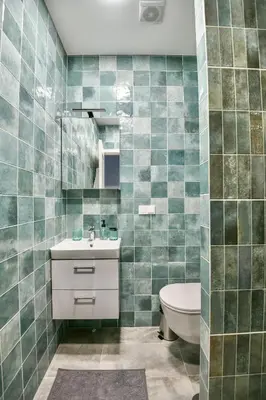 a bathroom with a sink and a toilet at Stunning new flat in Old Town of Vilnius in Vilnius