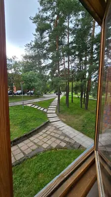 a view of a walkway from a window at Kristi Apartments in Visaginas