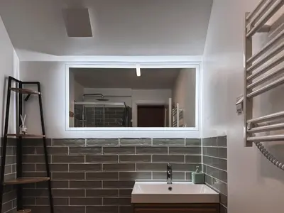 a bathroom with a sink and a mirror at Mulberynas in Stakliškės