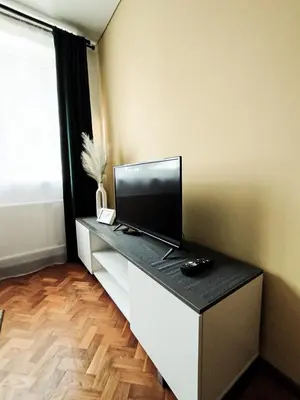 a room with a desk with a computer on it at Cozy A Noko Apartment in Murava