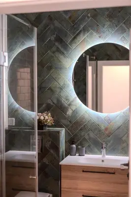 a bathroom with a mirror and a sink at Old Town - Bajor Studios 2 - Self Check-in and Parking in Kaunas