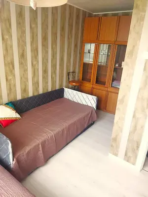 a bedroom with a bed in a room at Itaja apartment 49 in Šiauliai