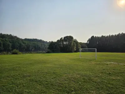 an open field with a soccer goal in a field at Vilos NEMUNO SLĖNIS namukai in Birštonas