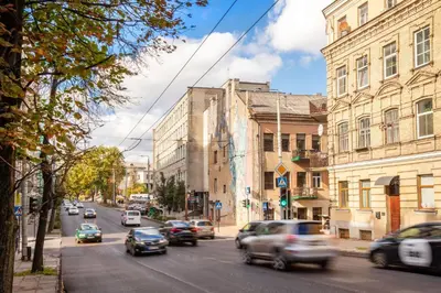 a busy city street with cars driving down the street at The K1A Studio Collective in Vilnius