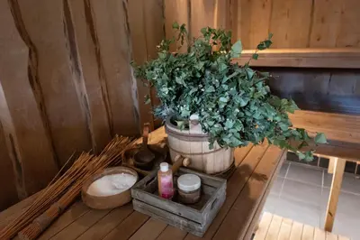 a potted plant sitting on a table in a room at Vila Pušyno 4 in Kulautuva