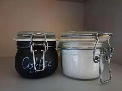 two jars of food sitting next to each other at Urban Escape Kaunas - Quiet Apartment 5 km from City Center in Kaunas