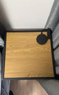 a wooden table with a mouse on top of it at Moncerat in Šiauliai