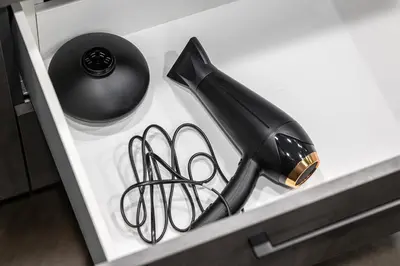 a pair of scissors sitting in a drawer at Modern Oasis in Vilnius Center by Reside Baltic in Vilnius