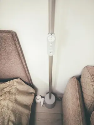 two seats in a train with a lamp between them at Cozy Ozo apartments, free parking! in Vilnius