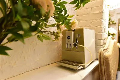 a camera sitting on a table next to a wall at HOST apartment 3 in Kaunas