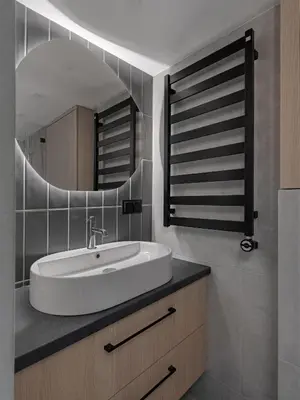 a bathroom with a sink and a mirror at Modern loft in City centre Self check-in No 45 in Vilnius