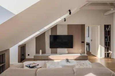 a living room with a couch and a tv at ᴄᴏʜᴏsᴛ I 2BD Penthouse Luxury-Designer Apt, CityCenter in Kaunas