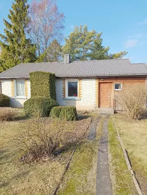 a house with a yard with a driveway at Via baltica in Degėsiai