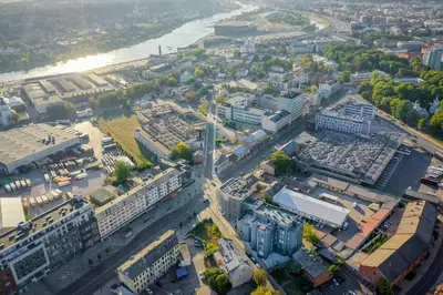 an aerial view of a city with a river at Top Loft Kaunas in Kaunas