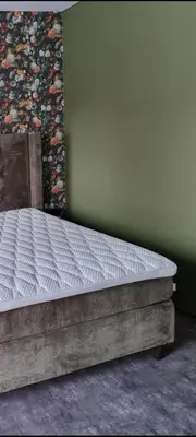 a mattress sitting in a room next to a wall at Durpyno 3c SELF CHECK-IN in Panevėžys
