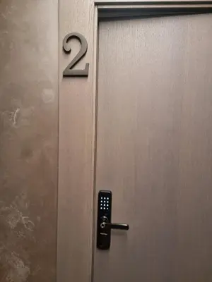 a metal door with the number two on it at Durpyno 3c SELF CHECK-IN in Panevėžys