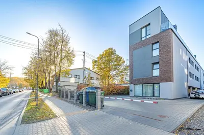 a building on the side of a street at Oak Park Apartment in Kaunas