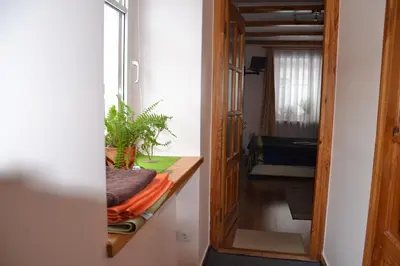 a room with a counter and a door with a window at Danarent Apartment in Vilnius