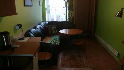 a living room with a couch and a table at Danarent Apartment in Vilnius
