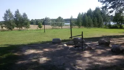 a group of lambs playing soccer in a field at Sodyba Pas Drambliuka in Svėdasai