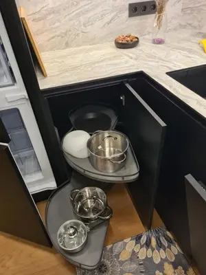 a kitchen with two dishes on a shelf in a refrigerator at Riverside Retreat Near City in VNO