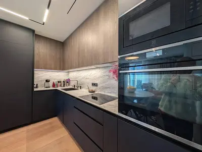 a kitchen with a sink and a microwave at Riverside Retreat Near City in VNO