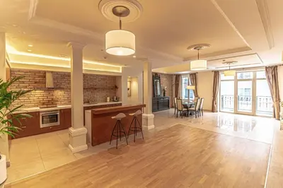 a large room with a kitchen and a living room at Luxury & Best location in Vilnius