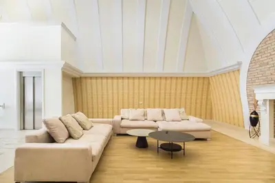 a living room with a couch and a table at Luxury & Best location in Vilnius