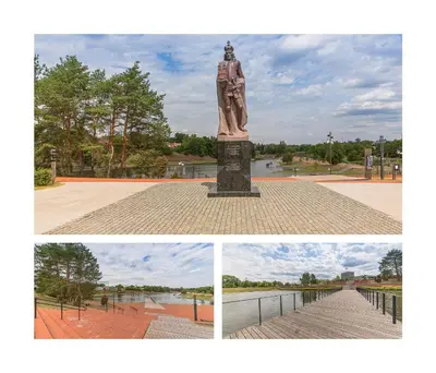 a statue of a woman standing in a park at Town Square Apartment in Panevėžys