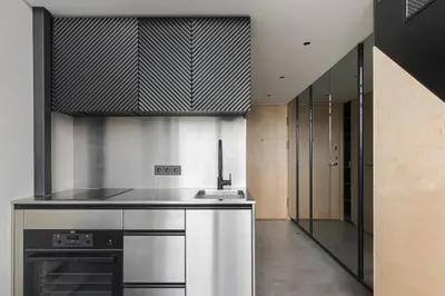 a kitchen with a sink and a stove at Stylish Designer Loft in Vilnius Trendiest District in Vilnius