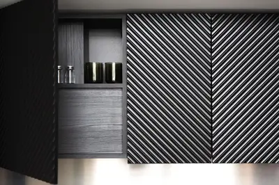 a black and white kitchen with black and white stripes at Stylish Designer Loft in Vilnius Trendiest District in Vilnius