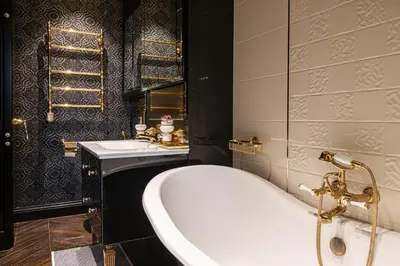 a bathroom with a tub and a sink at Basanaviciaus 9 in Vilnius