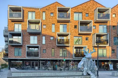a statue of a rabbit sitting in front of a building at Amazing central apartments x free parking x SELF CHECK IN 24x7 in Vilnius