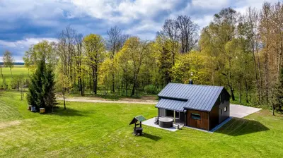 an overhead view of a tiny house in a field at Vila Valentino in Klepšiai