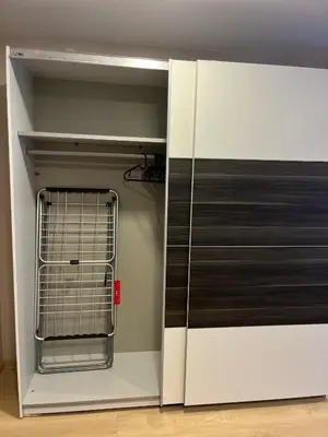 a refrigerator with its door open in a room at Kakava House in Nemėžis