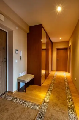a hallway with a bench in a room at DJ home in Druskininkai