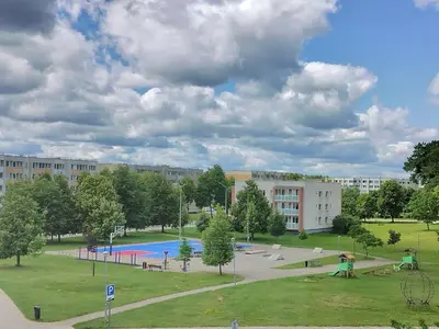 an empty park with a playground and a playground at Apartamentai dviems Ignalinoje in Ignalina
