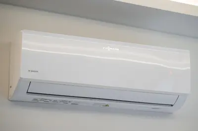 a close up of a white microwave oven at Newly Furnished Vilnius Town Hall Apartments by Reside Baltic in Vilnius